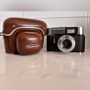 Black and Brown Vintage Voigtlander Vito Camera and Leather Case